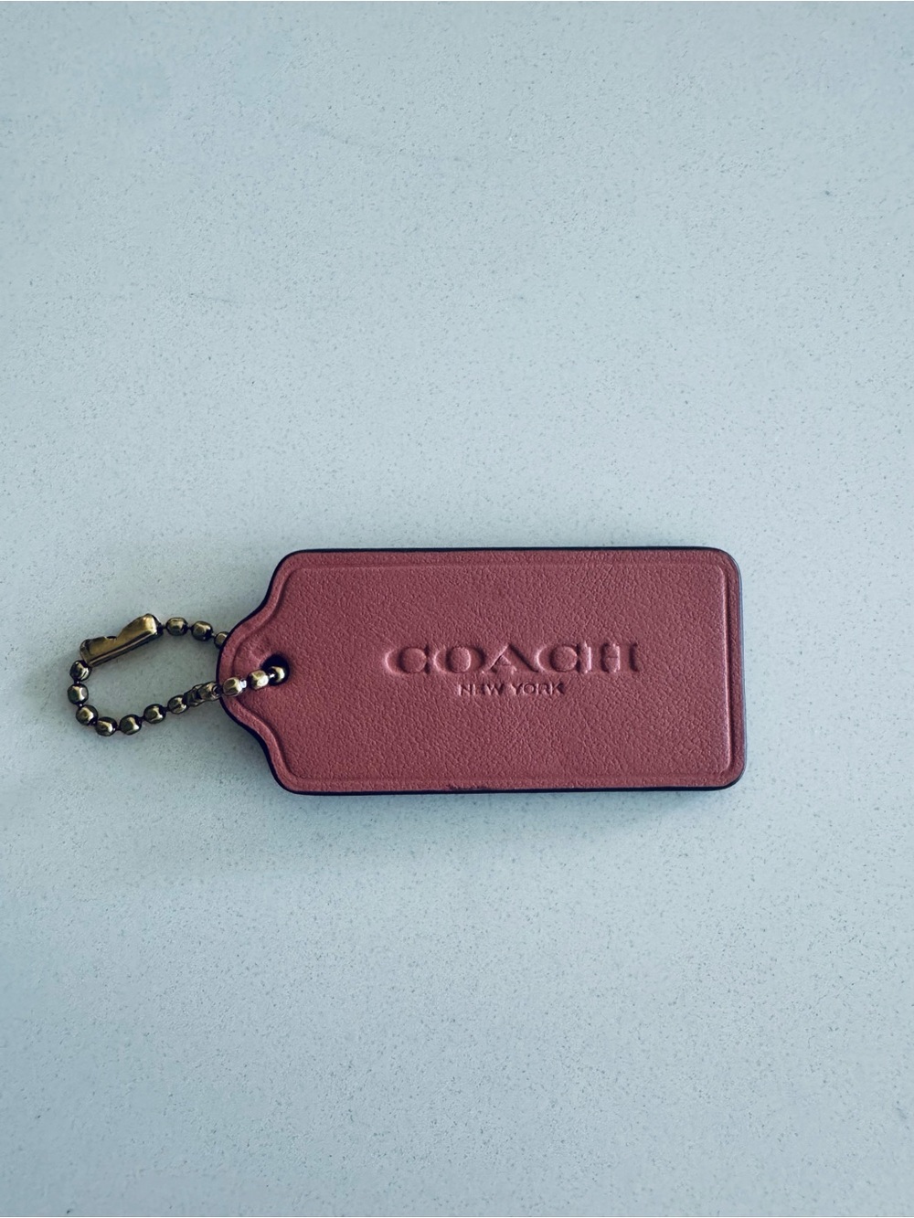 Coach Smooth Leather Hangtag Charm Embossed Coach New York Tan Pinkish Color - Picture 3 of 3